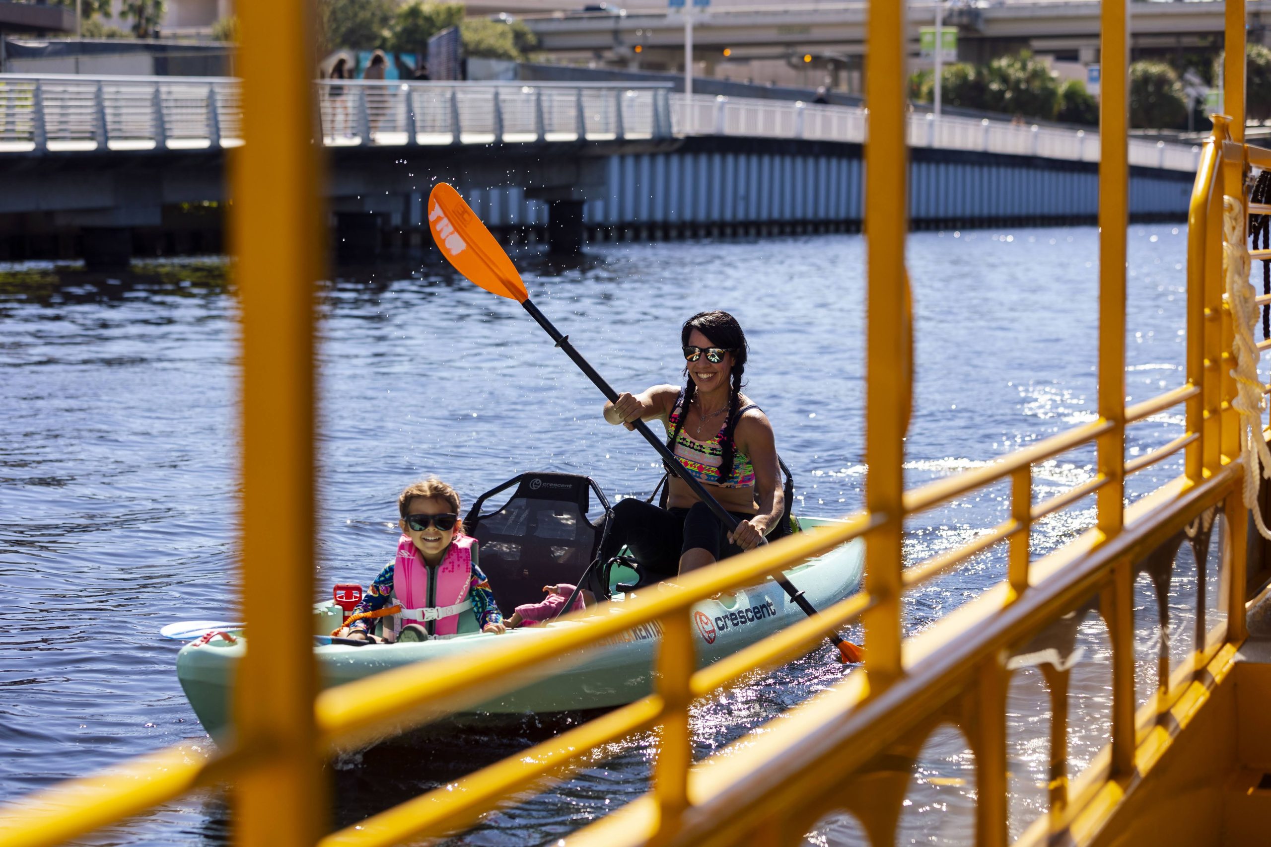 women and girl kayaking 